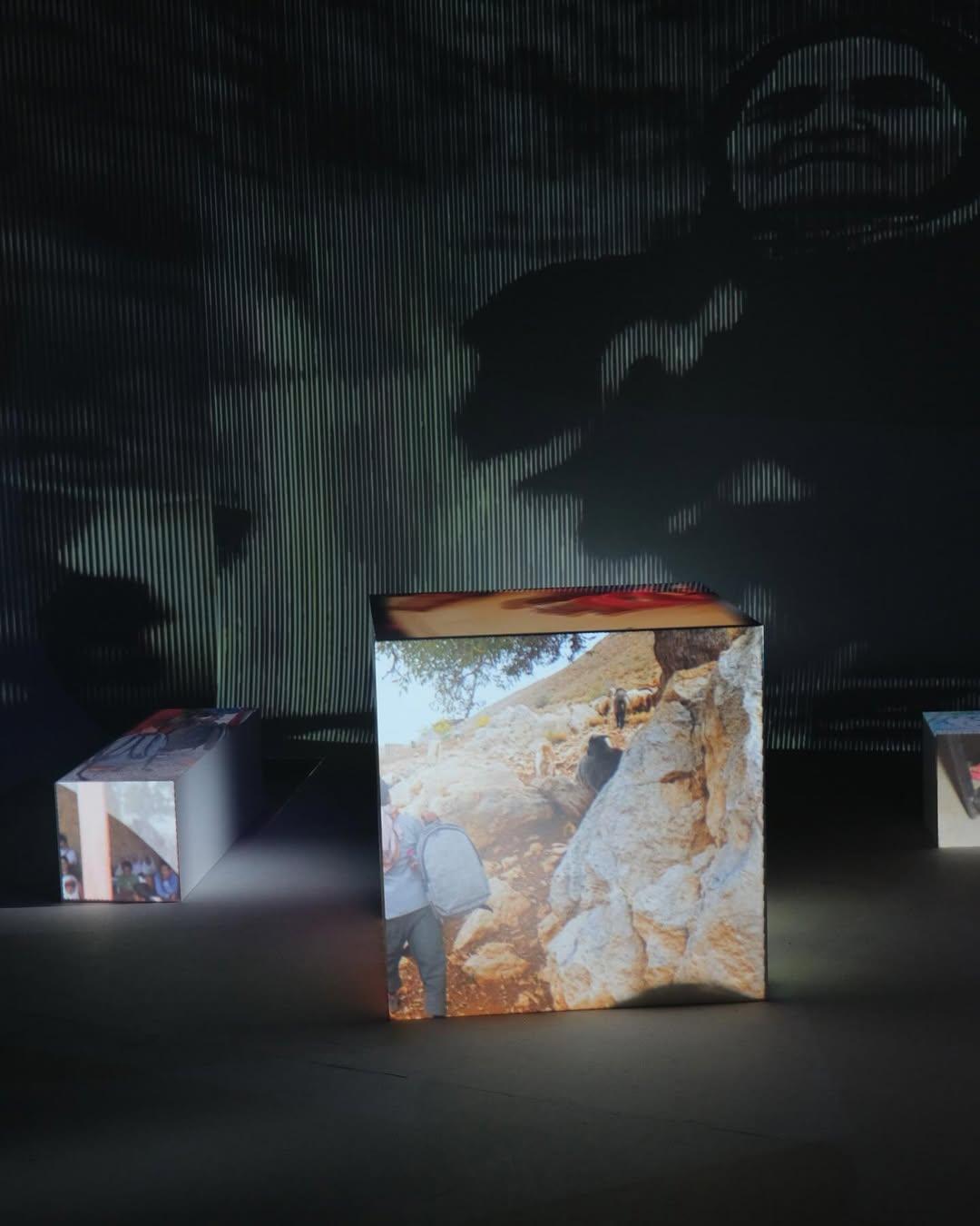 Projection-mapped cubes inside an infinity room installation at Bermont Studio Toronto